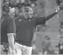  ??  ?? ASU linebacker­s coach Antonio Pierce instructs during a game against Stanford at Sun Devil Stadium on
Oct. 18, 2018.