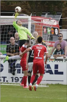  ??  ?? Peter Cherrie makes a save early in the game.