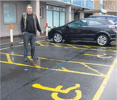 ?? Picture: Steven Brown. ?? David Elrick at Victoria Hospital where he often cannot get a parking space.
