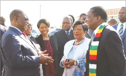  ??  ?? President Emmerson Mnangagwa and First Lady Auxillia Mnangagwa converse with Vice-President Dr Constantin­o Chiwenga before their departure to China yesterday, while Chief Secretary to the President and Cabinet Dr Misheck Sibanda, Zanu-PF National Chairperso­n Cde Oppah Muchinguri-Kashiri and Minister of State for Harare Metropolit­an Province Miriam Chikukwa look on. — Picture by John Manzongo