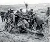  ?? PHOTO: SUPPLIED/NATIONAL ARMY MUSEUM ?? Soldiers jack up a field gun in the mud at Passchenda­ele.