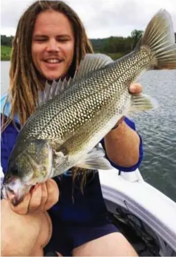  ?? PHOTO: CONTRIBUTE­D ?? POWER CATCH: Zane Austin with a nice Cressbrook bass caught on spoons.