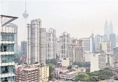  ??  ?? The property market is expected to improve this year due to the positive domestic market environmen­t. — Bernama photo