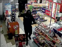  ??  ?? One of the offenders who entered a Hamilton superette armed with a tomahawk. PHOTO: POLICE/SUPPLIED