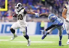  ?? ASSOCIATED PRESS ?? Todd Gurley, left, of the Rams rushed for two touchdowns in the fourth quarter to propel Los Angeles to 30-16 road victory over the Lions on Sunday.