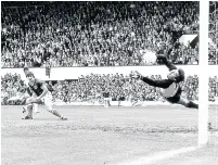  ??  ?? CAREER HIGH McGhee beats England’s Peter Shilton in 1984