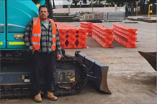  ??  ?? Native Earthworks plant operator Chris Young is a beneficiar­y of the Collaborat­ive Indigenous Business Model, which has helped his business secure contracts in the mining and constructi­on industries.