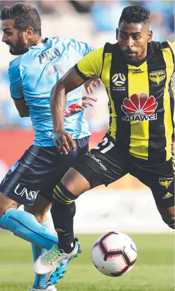 ?? Picture: AAP IMAGE ?? Sydney FC’s Michael Zullo can’t stop rampant Wellington star Roy Krishna during yesterday’s Round 7 A-League clash at Jubilee Stadium in Sydney