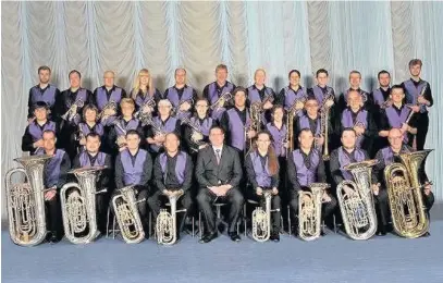  ??  ?? Wantage Silver Band with musical director Paul Holland