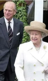  ??  ?? ●●Queen Elizabeth II and Prince Philip, the Duke of Edinburgh, on a visit to Stockport in Oct 2000