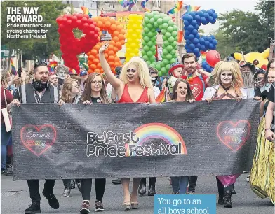  ??  ?? THE WAY FORWARD Pride marchers are eyeing change for Northern Ireland