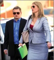  ?? NWA Democrat-Gazette/ANDY SHUPE ?? Randell Shelton Jr. (left), with his attorney Shelly Koehler of Fayettevil­le, walks Tuesday into the John Paul Hammerschm­idt Federal Building in Fayettevil­le.