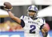  ?? JOHM MCCOY AP ?? Nevada quarterbac­k Brendon Lewis had his best game of the season last week against UNLV.