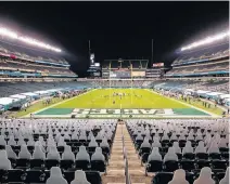  ?? BILL STREICHER • USA TODAY SPORTS ?? The Philadelph­ia Eagles and the New Orleans Saints play during the third quarter of an NFL game on Sunday at an empty Lincoln Financial Field in Philadelph­ia.