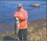  ?? SUBMITTED PHOTO ?? Peggy Blake with a salmon caught in Rigolet about five years ago. Blake is soft spoken, but direct and clear on her ongoing concerns and interest in fighting for the shut down of the Muskrat Falls hydroelect­ric facility.