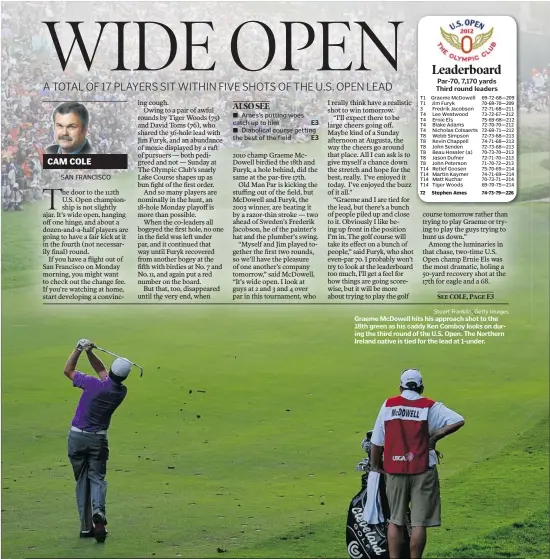  ?? Stuart Franklin, Getty Images ?? Graeme McDowell hits his approach shot to the 18th green as his caddy Ken Comboy looks on during the third round of the U.S. Open. The Northern Ireland native is tied for the lead at 1-under.