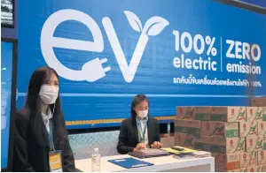  ?? SOMCHAI POOMLARD ?? Signs promoting electric vehicles at Sustainabi­lity Expo 2022, which took place at the Queen Sirikit National Convention Center in September.