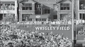  ??  ?? In these renderings, the Cubs show what changes they would make to Wrigley Field’s outfield seating as part of their renovation plan.