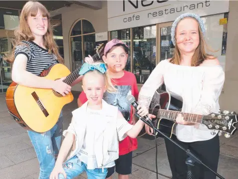  ?? Picture: MARK WILSON ?? TALENT: Amy Stewart, 14, Juliet Feldman, 7, show assistant Jalen Freame, 10 and Alisha Jones, 14 tune up.