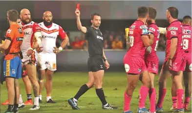  ?? ?? The sending-off of Catalans forward Gil Dudson (second left) preceded the ugly crowd scenes in Perpignan.
