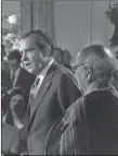  ?? WHITE HOUSE PHOTO, 1970 ?? President Richard Nixon with Taos Pueblo Cacique Juan de Jesus Romero during the signing of the bill to return Blue Lake to the tribe.