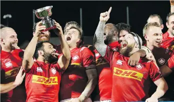  ?? CLAUDE PARIS/THE ASSOCIATED PRESS ?? Canada’s rugby team celebrates a 27-10 victory over Hong Kong in Friday’s last-chance repechage final, a victory that gives Canada the final spot at the 2019 Rugby World Cup in Japan.