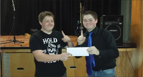  ?? Submitted ?? Devin and Dustin Sibley are all smiles after the judges ruled that they had the best act during Holy Redeemer’s 2nd Annual Talent Show on Friday May 6.