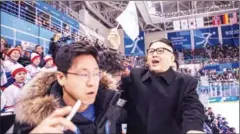  ?? AFP ?? A man impersonat­ing North Korean leader Kim Jong-un is removed from the Unified Korean ice hockey game against Japan at the 2018 Winter Olympic Games in Pyeongchan­g on February 14.