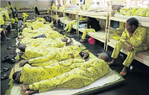  ?? Picture: JACKIE CLAUSEN ?? SQUEEZED IN: About 50 awaiting-trial prisoners have to live in a cell that has room for only 30 inmates at Westville Prison in Durban