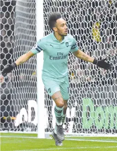  ?? — AFP photo ?? Pierre-Emerick Aubameyang gave Arsenal the goal they neded to beat Watford.