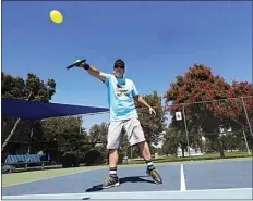  ?? ALEX HORVATH / THE CALIFORNIA­N / FILE ?? Aaron Whitehead returns a shot from opponent Ajana Orozco during a game of pickleball on the Jastro Park courts in this 2019 file photo. Pickleball lovers are expected to flock to the park on Saturday for the inaugural Pickleball and Music Festival.