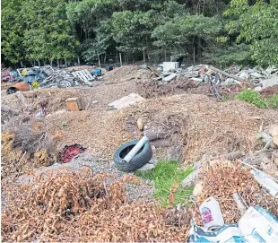  ?? Picture: Kim Cessford. ?? Piles of rubbish which Dundee City Council will have to deal with on land at Balgarthno, Wester Gourdie Industrial Estate.