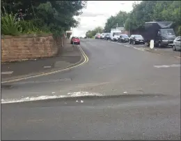  ??  ?? The damage to Mary Mackie’s car is clear and – despite council claims the road is regularly checked – the unexpected obstacle on the road is still there