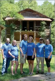  ?? Janelle Jessen/Herald-Leader ?? The new owners of Gypsy Camp and Canoe stood in front of one of the camp’s historic buildings. The property, which is listed on the National Register of Historic Places as the Gypsy Camp Historic District, was once a girls’ summer camp and includes 11...