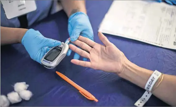  ?? Photo: Mario Anzuoni/Reuters ?? Lifeline: Testing blood sugar regularly can save a diabetic’s life, but can cost hundreds of rands a month.