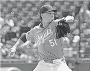  ?? PETER AIKEN USA TODAY Sports ?? Kansas City Royals starting pitcher Brady Singer delivers a pitch in the first inning against the Milwaukee Brewers at Kauffman Stadium.