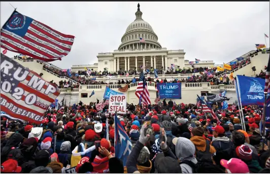  ??  ?? VIOLENT ONSLAUGHT: A mob of Donald Trump supporters storm the Capitol in Washington last week, after years of being egged on by the President