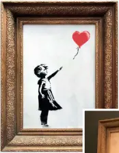  ??  ?? BEFORE... Banksy’s artwork, Girl With Balloon, prior to the auction