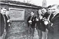  ?? PHOTO: AUCKLAND STAR ?? All Blacks (from left) Ian Smith, John Major, Dennis Young, Ralph Caulton, Brian Lochore, Colin Meads and Paul Little pose by the Ellis plaque at Rugby School during New Zealand’s 196263 tour of England.