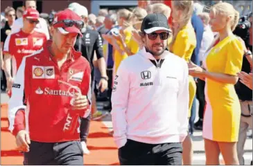  ??  ?? EN LO MÁS ALTO. Vettel y Alonso fueron los pilotos que más cobraron en 2015 según ‘ Totalsport­ek’.
