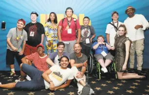  ?? Rich Polk / Getty Images for IMDb ?? The cast of “Flash” poses for a picture with kids from Make-A-Wish on the IMDboat at San Diego Comic-Con.
