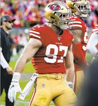  ?? Monica M. Davey EPA/Shuttersto­ck ?? NICK BOSA HAD TWO of San Francisco’s six sacks against Minnesota. “It is a little crazy to see him in this position in just his first year,” said the Chargers’ Joey Bosa, Nick’s older brother.