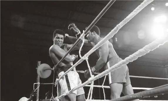  ??  ?? Muhammad Ali [left] invites a barrage of punches from
George Foreman during the “Rumble in the Jungle”
