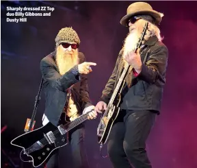  ??  ?? Sharply dressed ZZ Top duo Billy Gibbons and Dusty Hill