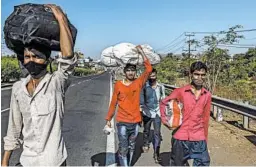  ?? ATUL LOKE/THE NEW YORK TIMES ?? During the past two months under India’s lockdown, millions of migrant laborers and their families have poured out of cities as they try to get back to their native villages.