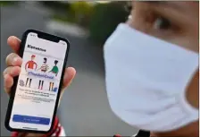  ?? (Photo AFP) ?? L’applicatio­n Tousantico­vid sert de plateforme au « certificat numérique Covid européen ».