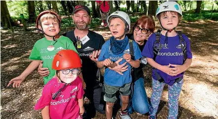  ?? PHOTO: SIMON O’CONNOR/STUFF ?? The Conductive Education Taranaki camp is the first of its kind in the region. From left, Danae Pringle, 3, (front in pink), Daniel Sedgwick, 7, Craig Nielsen, Zak Nielsen, 7, Grace Wesolowska of Te Karaka Foundation, and Bethan Bridge, 9.