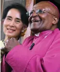  ??  ?? Blind eye: Aung San Suu Kyi with Desmond Tutu