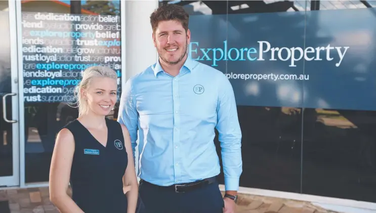  ?? Picture: STEWART MCLEAN ?? UNITED TEAM: Rent City and Andrew Evan Real Estate have merged to become Explore Property. Natiesha and Kyle Olufson at their new branded office.