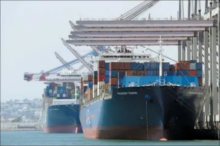  ?? THE ASSOCIATED PRESS ?? Ships are docked at the Port of Long Beach in Long Beach, Calif. Between them, the California ports of Los Angeles and Long Beach account for a large amount of the seaborne goods that the United States imports from China, and the prospect of a widening trade war between the global giants has port executives and longshorem­en worried.